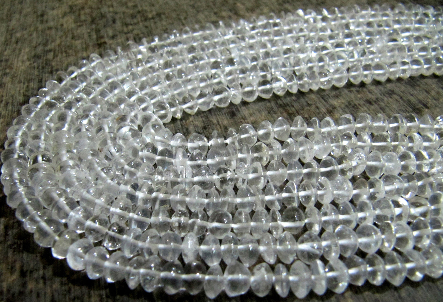 Natural Rock Crystal  Plain Smooth Button Shape 5 to 7mm Rondelle Top Quality Gemstone beads Strand 14 inches Long Wholesale Prices