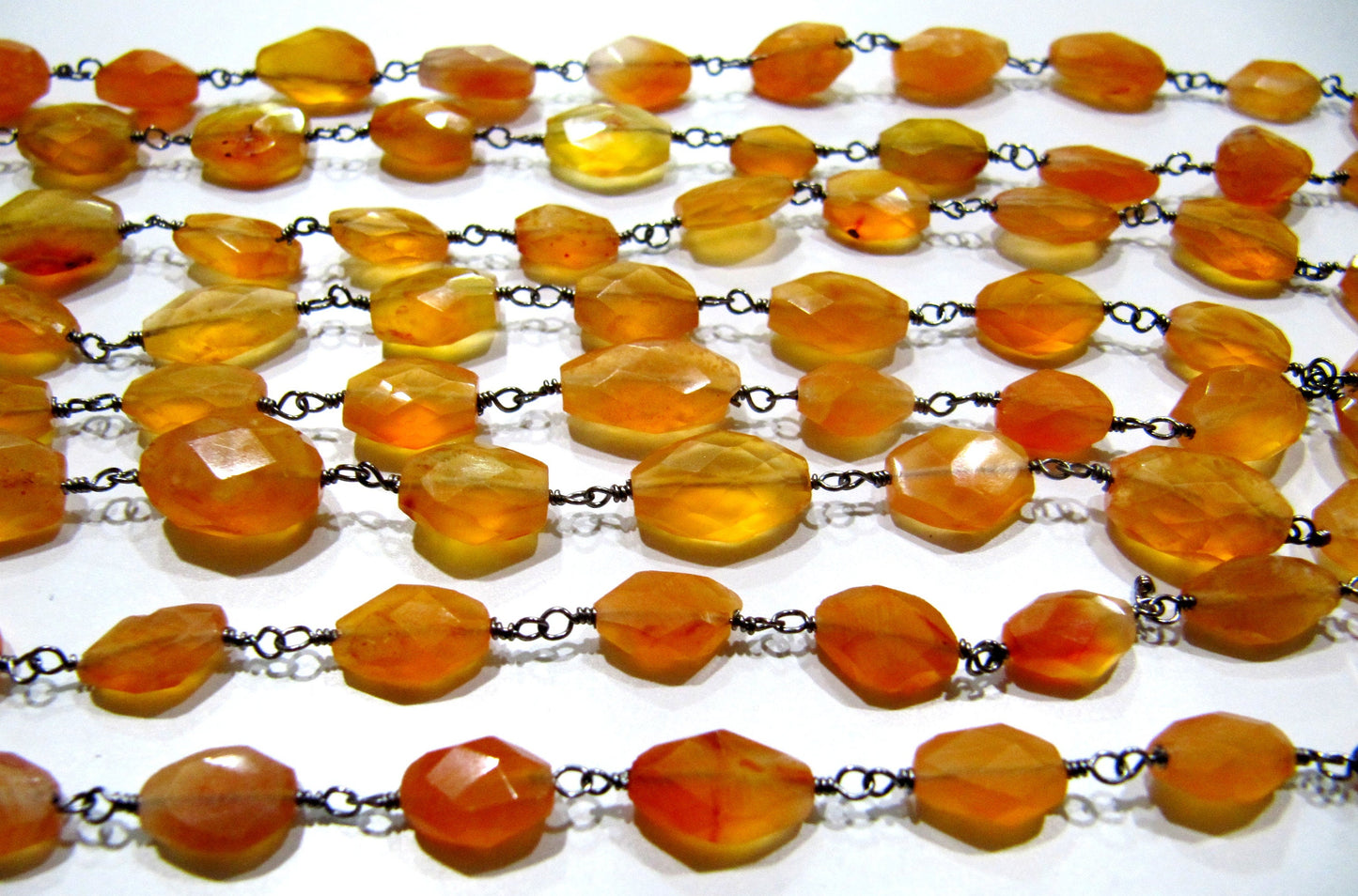 Natural Carnelian Oval Mani Shape Briolette Faceted 6X9mm Size Beaded Wire Wrapped Rosary Chain Wholesale Price Sold per Foot Choose color