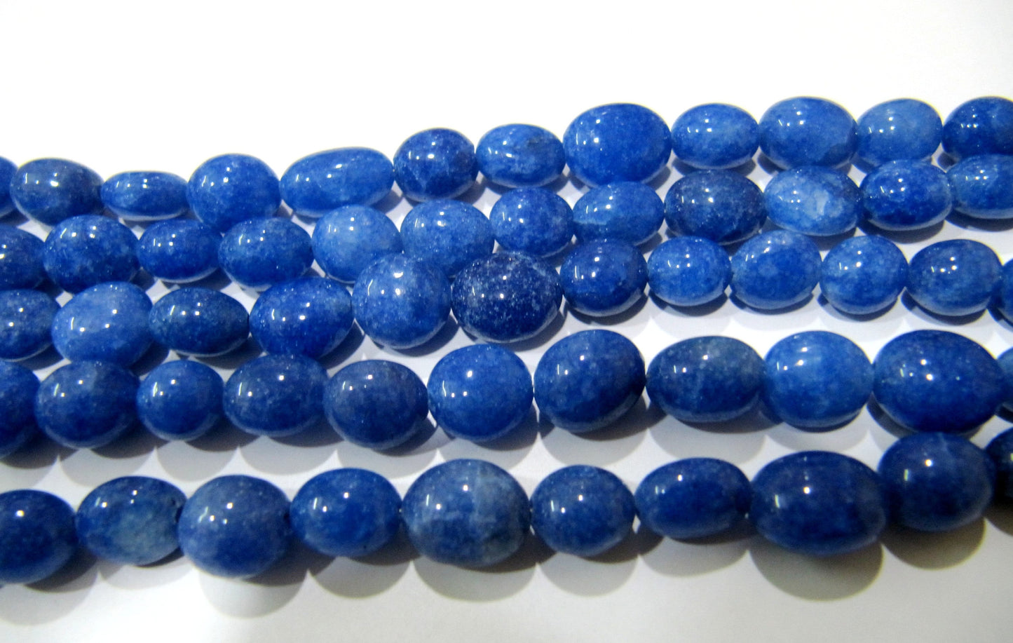 Dyed Blue Sapphire Quartz Oval Plain Smooth 7x9mm to 8x10mm Size Beads Strand 13 inches long Jewelry making Beads Wholesale Prices