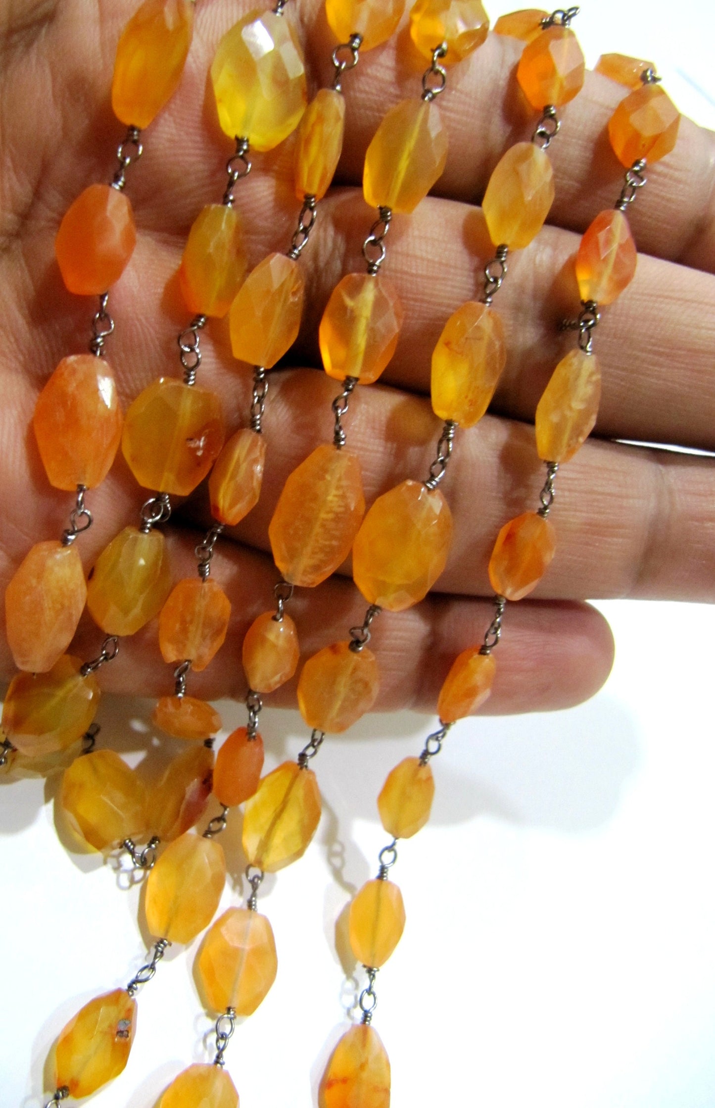 Natural Carnelian Oval Mani Shape Briolette Faceted 6X9mm Size Beaded Wire Wrapped Rosary Chain Wholesale Price Sold per Foot Choose color