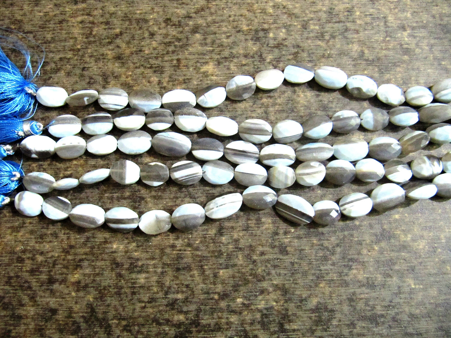 Natural Bolder Opal Faceted Oval Shape Briolette Size  10x14mm Strand 8 Inch Long .sold Per strand