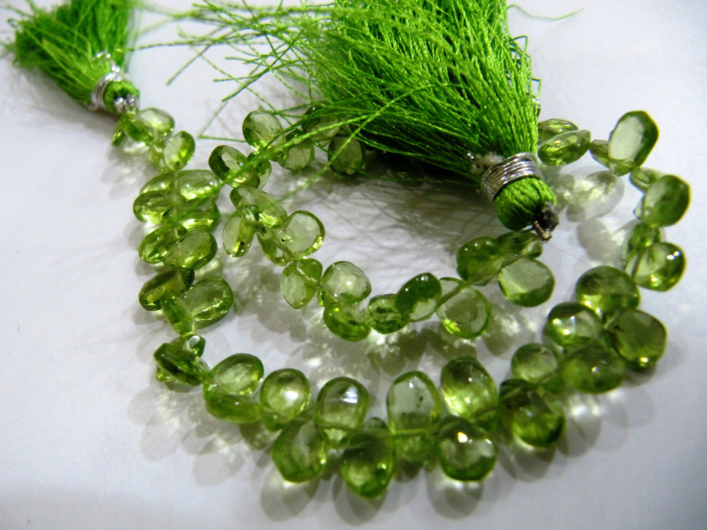 Natural Peridot Pear shape Briolette Beads size 4x6mm to 4x8mm strand 8 inches long. sold per strand
