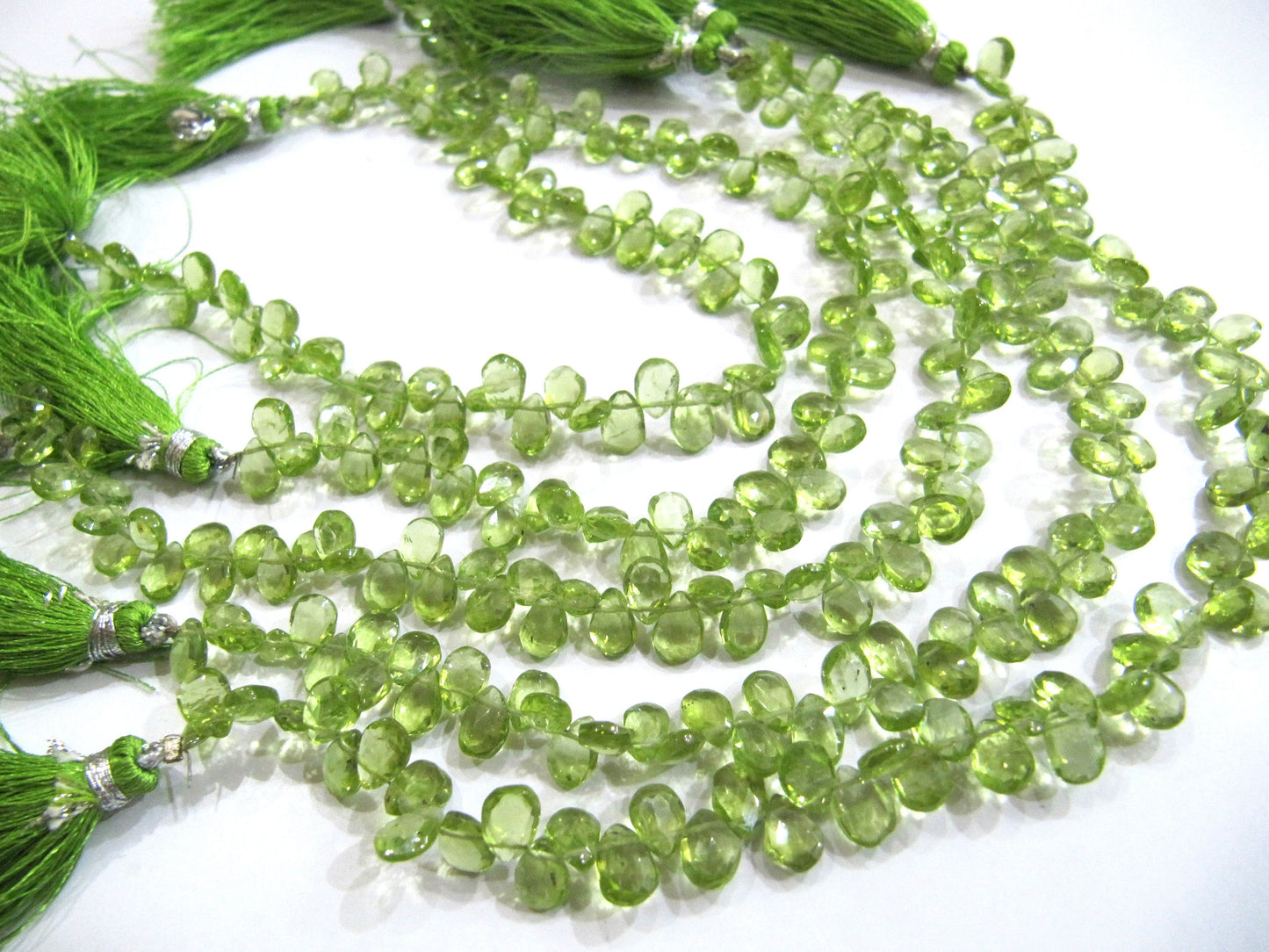 Natural Peridot Pear shape Briolette Beads size 4x6mm to 4x8mm strand 8 inches long. sold per strand
