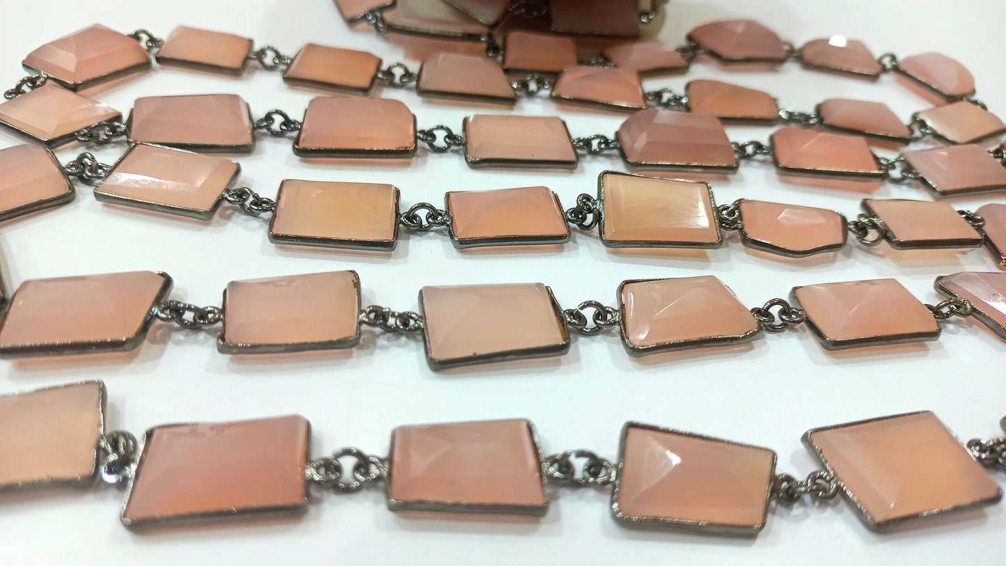 Natural pink Chalcedony 17 to 20mm Free Shape Nugget Tumbled Briolette Faceted Bezel Connector Chain Sold Per Foot Black Plated Chain.