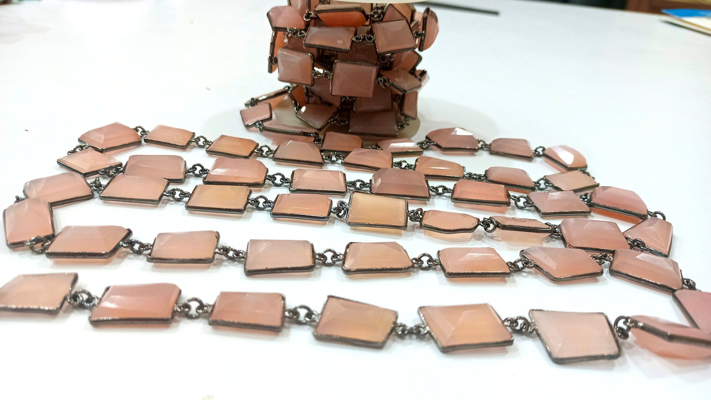 Natural pink Chalcedony 17 to 20mm Free Shape Nugget Tumbled Briolette Faceted Bezel Connector Chain Sold Per Foot Black Plated Chain.