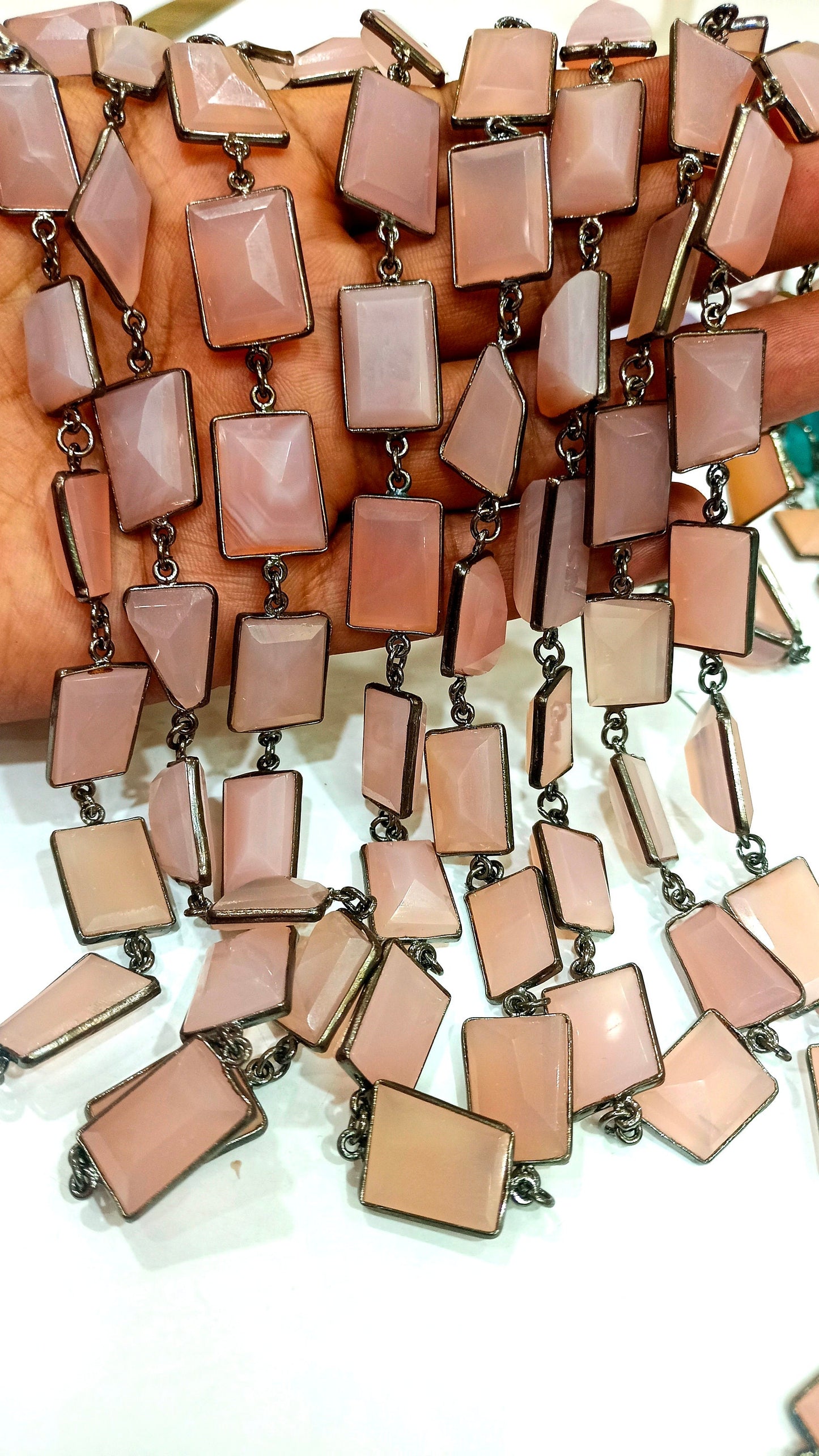 Natural pink Chalcedony 17 to 20mm Free Shape Nugget Tumbled Briolette Faceted Bezel Connector Chain Sold Per Foot Black Plated Chain.